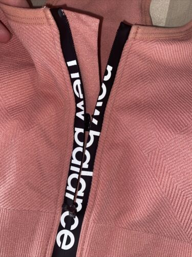 NEW BALANCE Medium Impact Sports Bra Style #R000440 DUSTED PEACH FRONT ZIP LOGO
