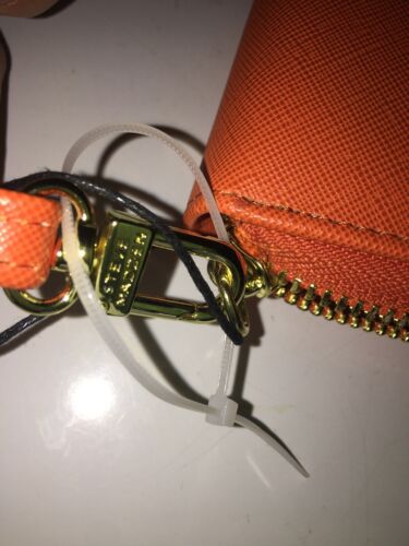 STEVE MADDEN WALLET WRISTLET ORANGE SMOOTH TEXTURE GOLD ZIPPER