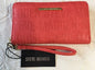 STEVE MADDEN WALLET WRISTLET CORAL STAMPED LOGO"MADDEN STYLE"!!!
