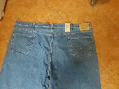 LEVI'S 550 RELAXED SITS AT THE WAIST LOOSE THIGH TAPERED LEG 52"X30"