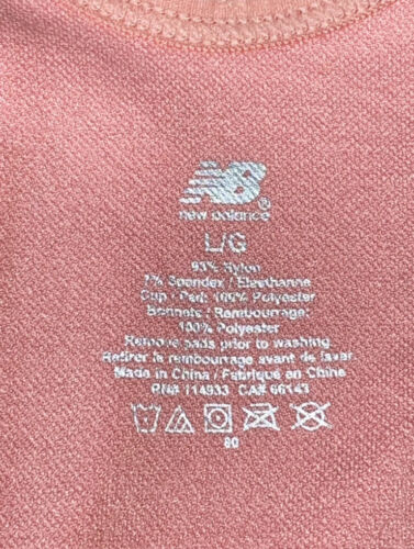 NEW BALANCE Medium Impact Sports Bra Style #R000440 DUSTED PEACH FRONT ZIP LOGO