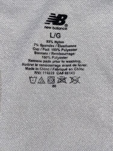 NEW BALANCE Medium Impact Sports Bra Style #R000440 GRAY~ FRONT ZIP LOGO