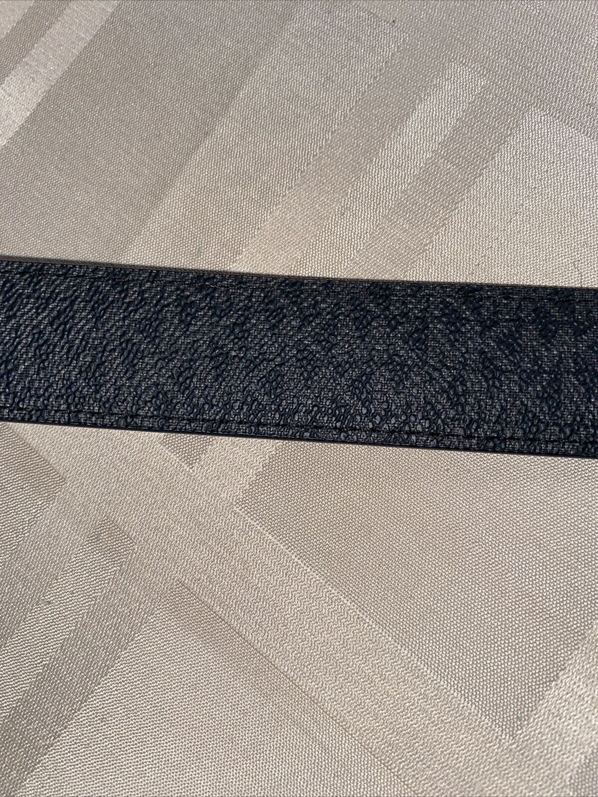 MICHAEL KORS BELT BLACK TO BLACK MK LOGO TWIST REVSESIBLE SILVER BUCKLE MSRP $58