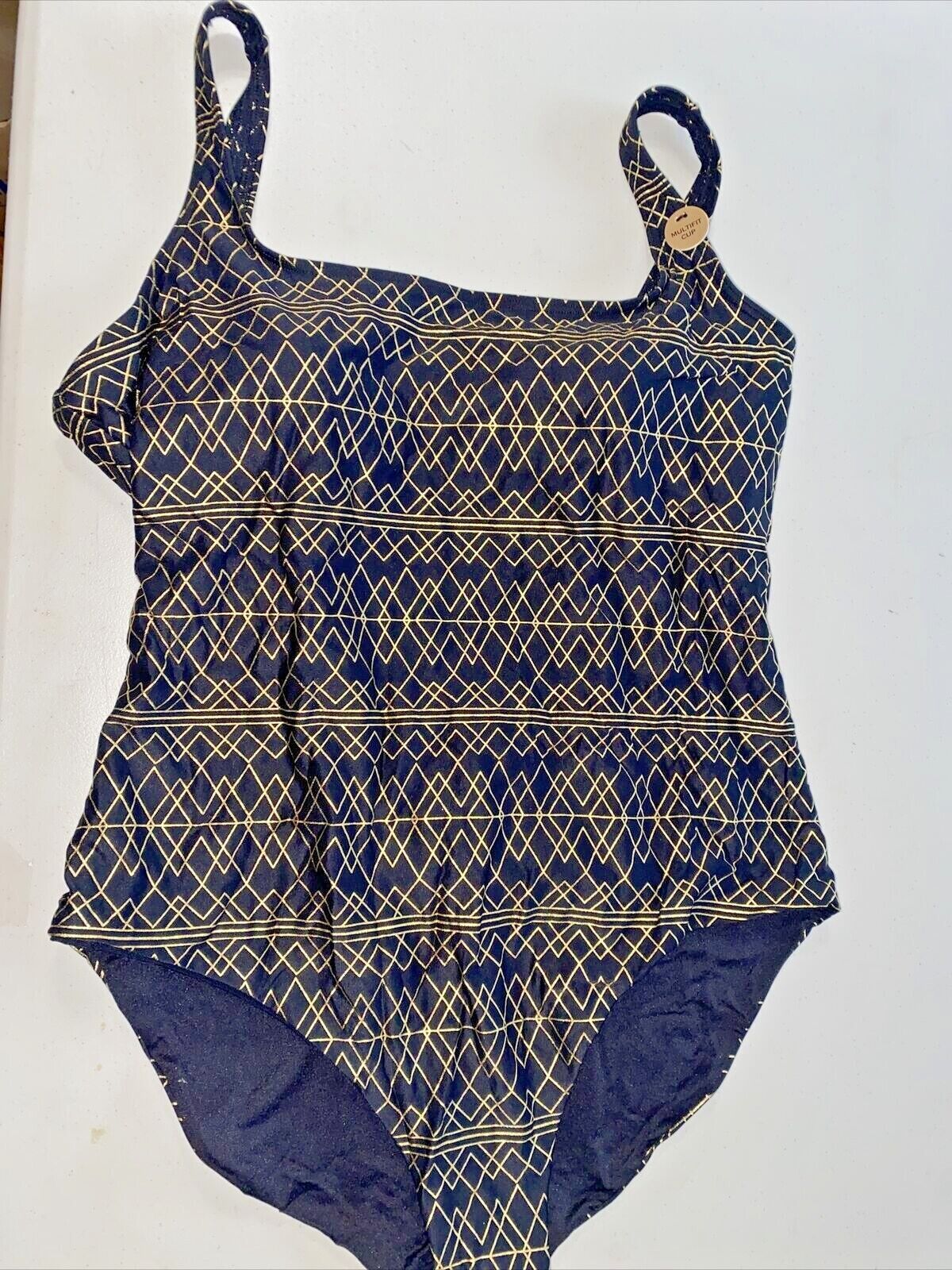 NIP TUCK BOND EYE ONE PIECE SWIMSUIT Black & Gold NWT