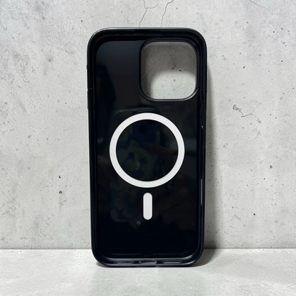 Black phone case with a white logo on a gray concrete background