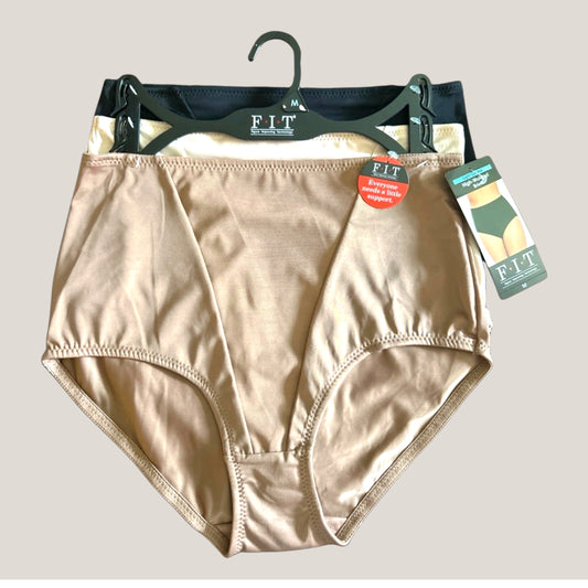 A set of three FIT by Fabrics high-waisted briefs in beige, black, and cream, hanging on a single dark green hanger against a solid light gray background.