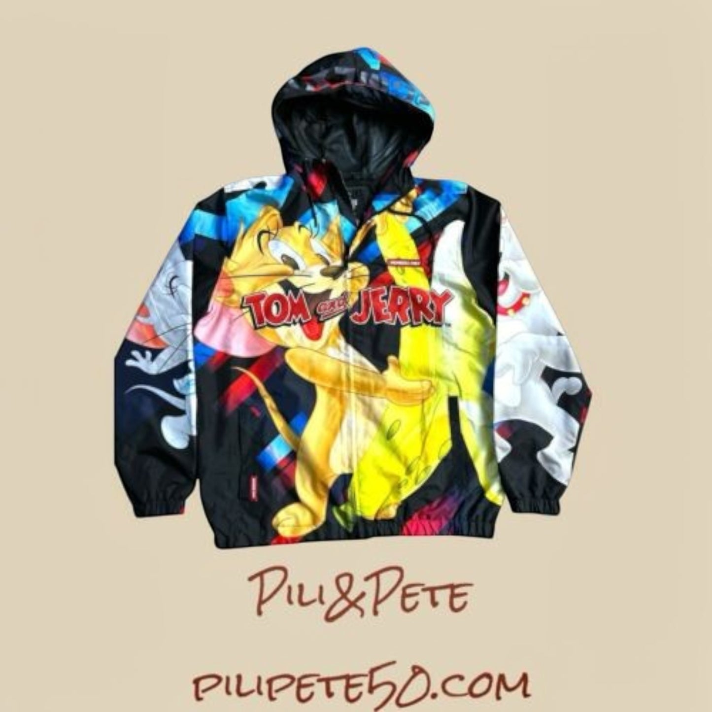 Pili&Pete black nylon windbreaker jacket with a vibrant Tom & Jerry print, featuring a hood and full zip.