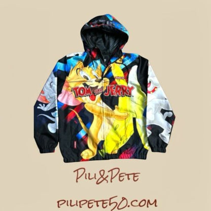 Pili&Pete black nylon windbreaker jacket with a vibrant Tom & Jerry print, featuring a hood and full zip.